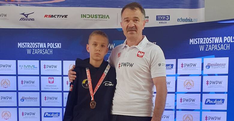 Jakub Grabda z trenerem Tadeuszem Szkwarkiem