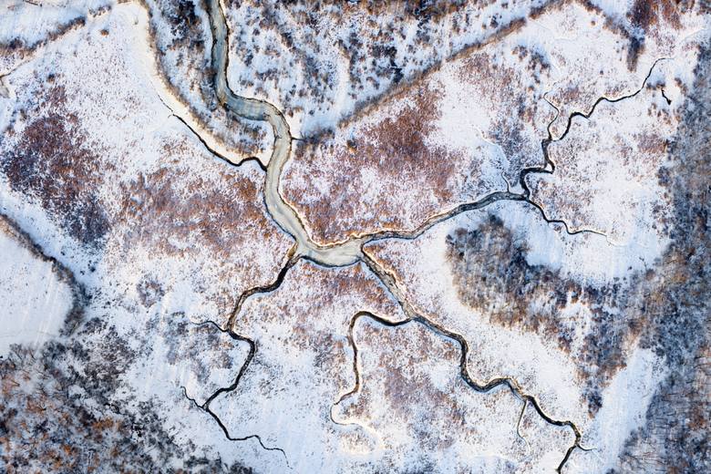 Zamarznięta rzeka jak tiramisu na zdjęciach Filipa Wolaka w Wozowni