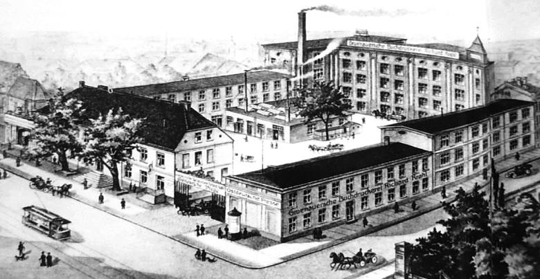 Pierwszą drukarnię przy ul. Poznańskiej 35 (ówczesna numeracja) Andrzej Fryderyk Gruenauer otworzył w 1806 roku, po czym w 1815 r. przeniósł ją do nowej siedziby przy ul. Jagiellońskiej  1. Pod tym adresem działała do 2005 r.