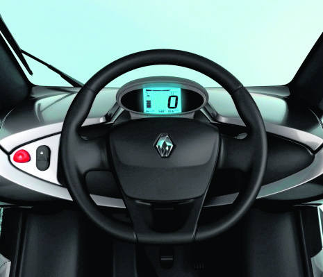 Kokpit Renault Twizy jest prościutki - prędkość, wskaźniki naładowania akumulatora, a z boku przycisk do ruszania fot. Renault