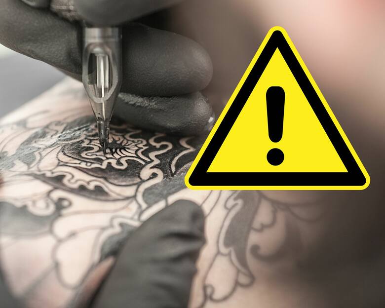 Robienie tatuażu na skórze i znak ostrzeżenia