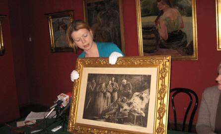Fotograwiorę obrazu -„Śmierć wygnanki”  1882 namalowanego w Radomiu pokazuje Paulina Szymalak.